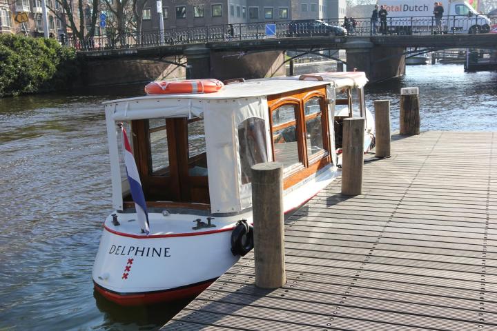 The boat at a dock on a canal