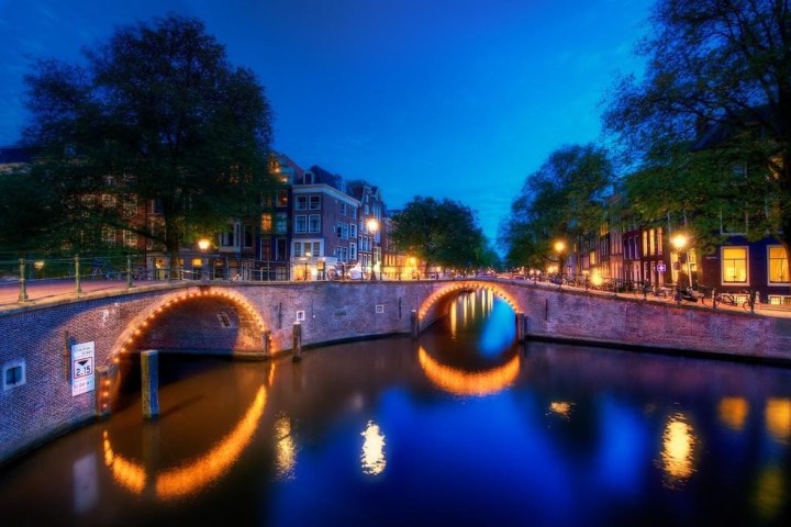 a bridge lit up at night